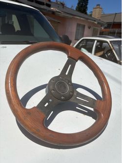 Wood grain steering wheel with quick release