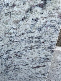 White Granite Slab with Gray and Burgundy Veining