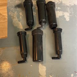 Five assorted sprinkler heads $15