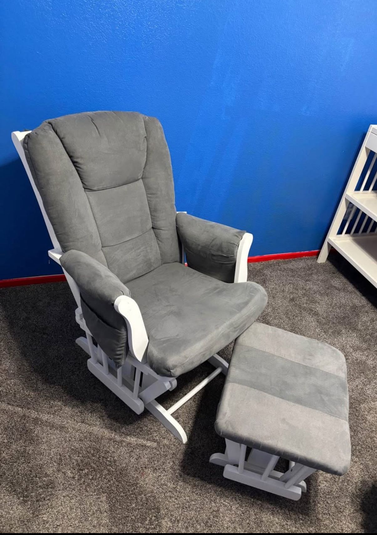 Gray Glider Rocking Chair with Ottoman.