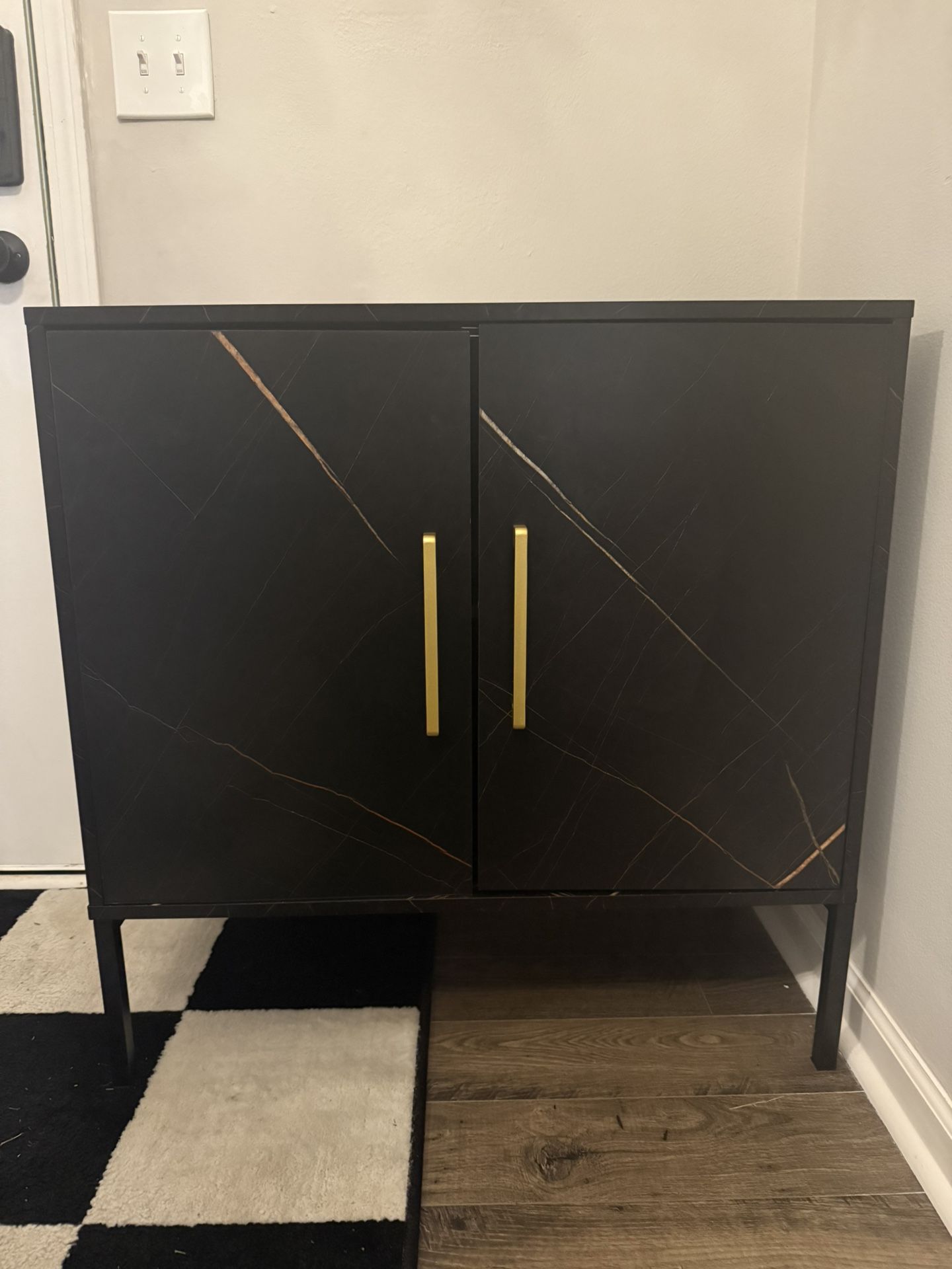 Small black accent cabinet