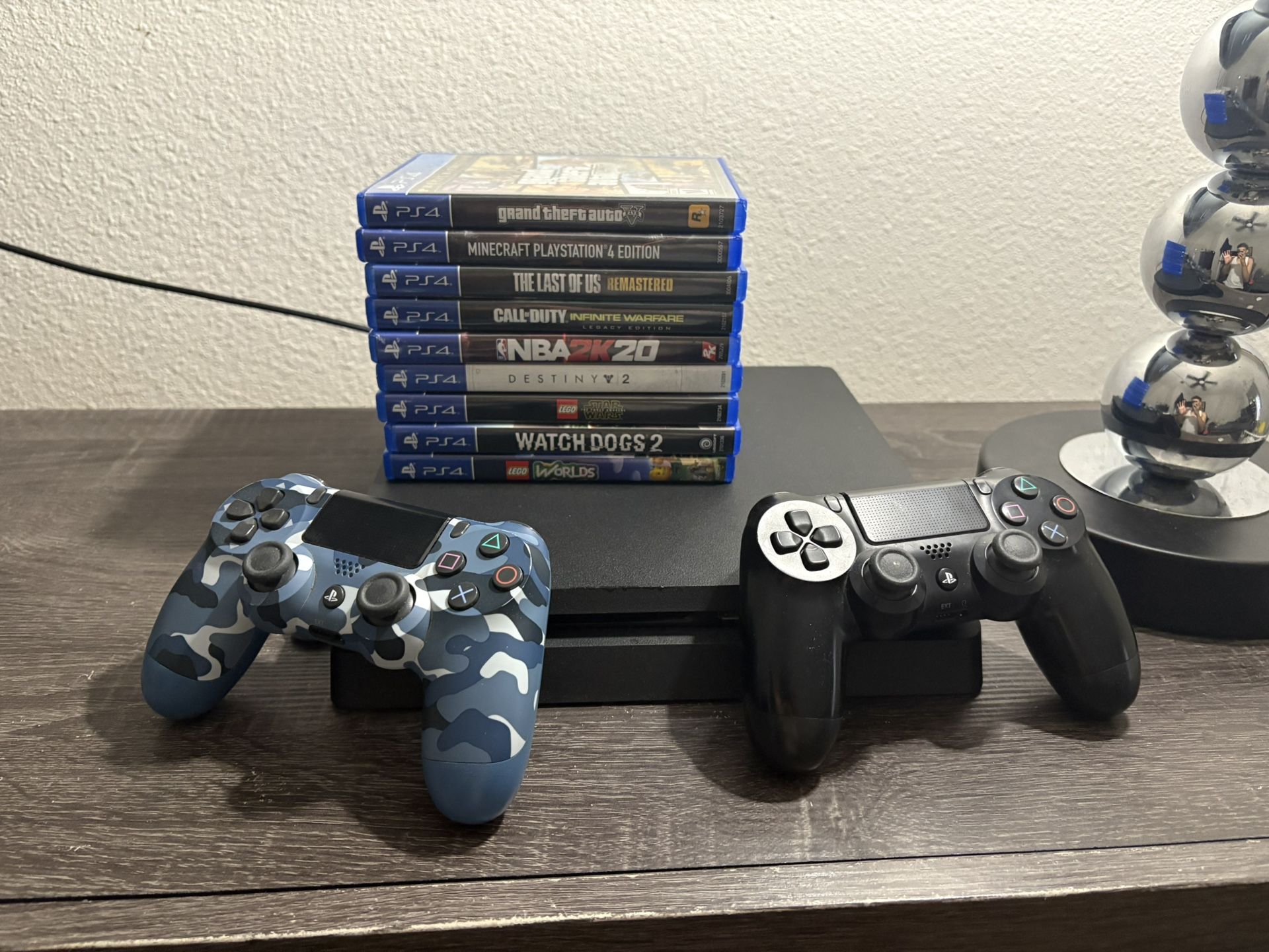 Ps4 With Games And 2 Controllers