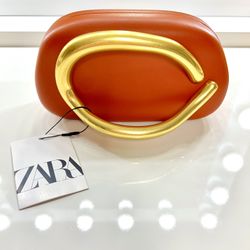 ZARA clutch bag, with crossbody chain strap. Color: Rich Tan/Burnt Orange - limited edition
