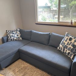 Estate Sale: Awesome Couch With storage And A Pull Out Sleeper 