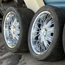 Set of 4 tires with rims.