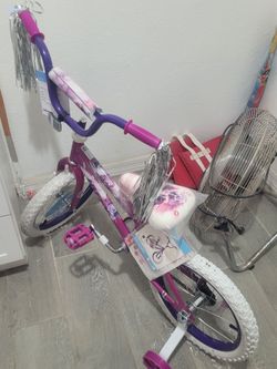 16 inch Brand new bike with training wheels