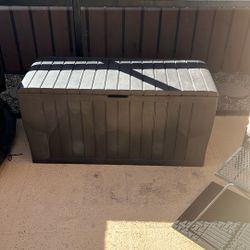 Patio Storage Box made by KET ER excellent for pool storage patio cushions, etc. has wheels for easy moving. Make it yours $40.