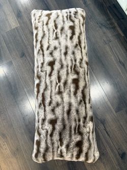 Super soft, like new brown-ish fury body pillow from Costco
