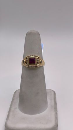 14k gold ring with red CZ