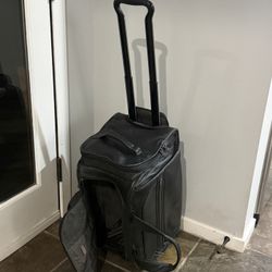 Tumi leather luggage