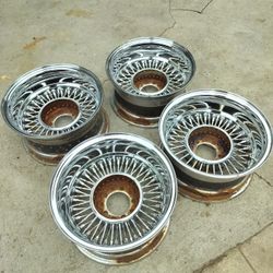14X7 WIRE WHEELS!!!4.50/4.75ON 5 !!CHEVY/, FORD/DODGE BOLT PATTERN!!! 525$