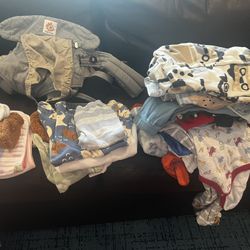 Free Baby Clothes And Carrier 