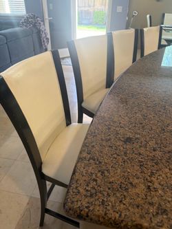 Four counter height bar stools