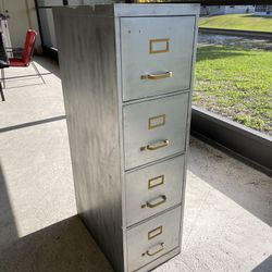 Metal filing cabinet good for a garage or shed everything Works $10