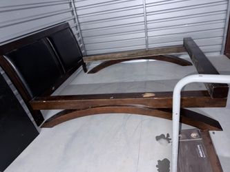 Queen bed , heavy wood.