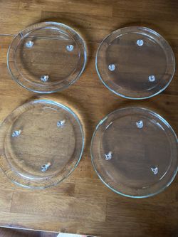 Candle holders and asking $5 for all 4. Measurements 7 3/4” round.