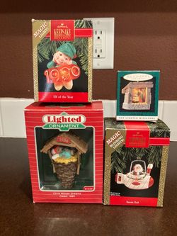 (4) Hallmark keepsake lighted ornaments All work great