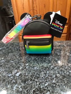 Disney Parks Pride Collection Mickey Mouse Loungefly Wristlet Brand New With Tags .  Size 6 inches tall with ears 7 1/2 inches tall and 5 1/2 inches w