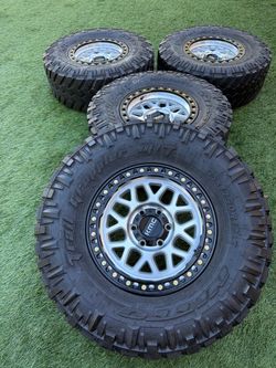 Kmc Chevy silverado wheels and tires 35