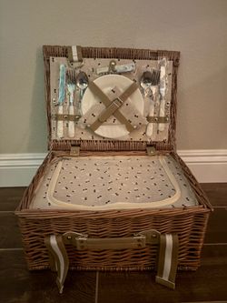 Willow picnic basket set features a charming cherry print lining and includes service for two people