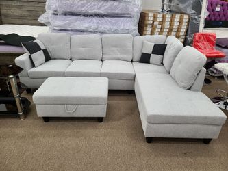 Free local delivery gray color sectional with pillows and ottoman