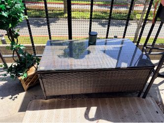 Outdoor wicker glass top table
