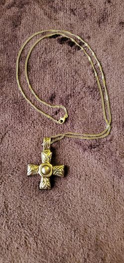sterling silver cross pendant featuring embossed leaf motifs and  central Freshwater pearl setting
