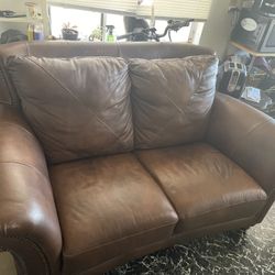 Brown Leather-Look Loveseat with Nailhead Trim