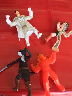 6 action figurines from different movies