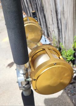 Two PENN Int'l 50 Rod & Reel Combos