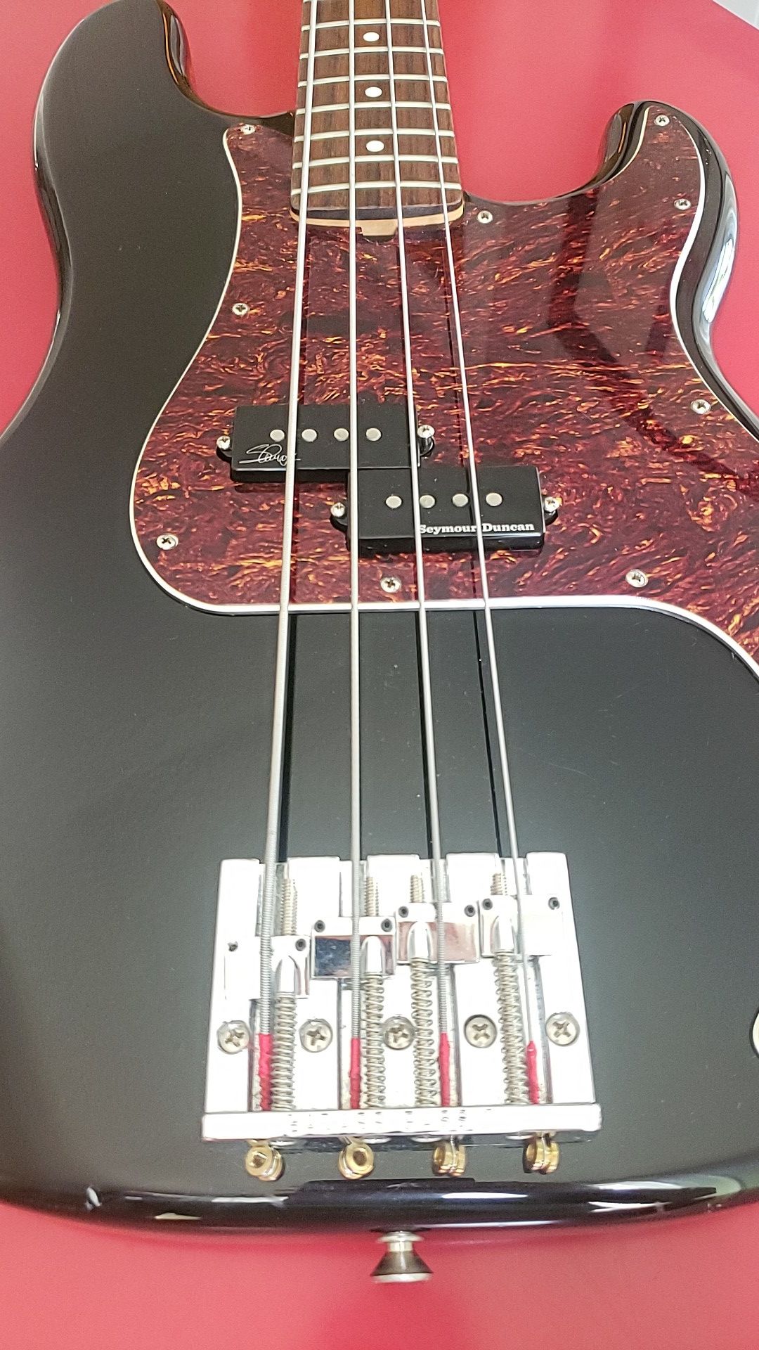 Fender P Bass, with upgrades. Badass II bridge & Seymour Duncan pickups. Includes hardshell case.
