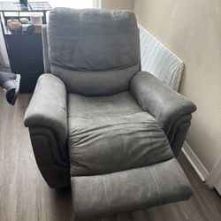 Gray Recliner Rocking Chair And Opens Up Very Comfortable