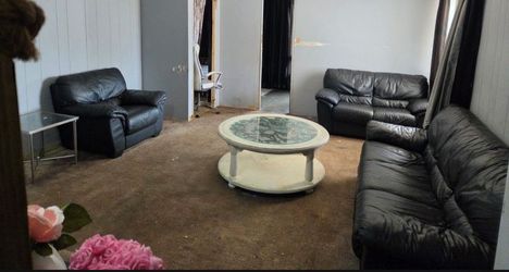 Real Leather Black Sofa Loveseat & Chair With A Coffee Table And A TV Stand $350