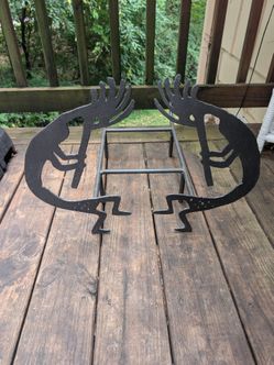 Kokopelli fire log holder stand rack