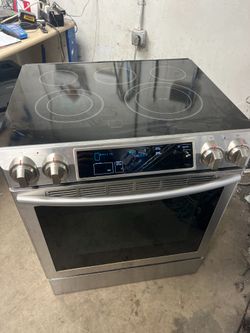 Samsung stainless steel glasstop stove , slide in  -free delivery 