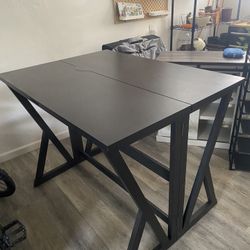  Folding Table with 4 chairs. 