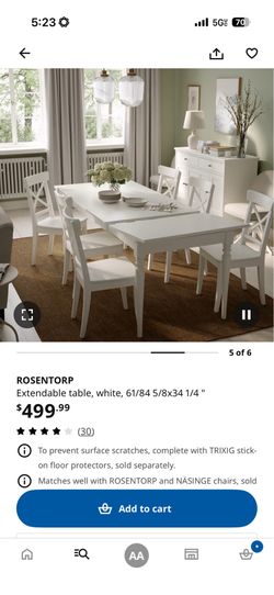 Extendable table in white with 6 chairs