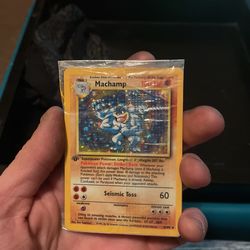 Holographic First Edition Unopened Machamp Pokémon Card