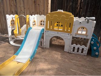 Small child’s swing and slide