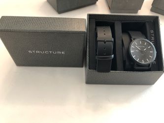 Beautiful men’s structure watch brand new in box with extra leather band still has plastic on dial