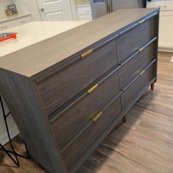 Brown Dresser With Gold Detail 
