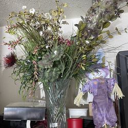 Beautiful faux flower arrangement with vase