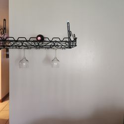 Used in Great Condition  Hanging Wine Bottles and Wine Glasses Metal Rack