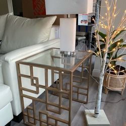 Glass accent metal gold colored geometric side table