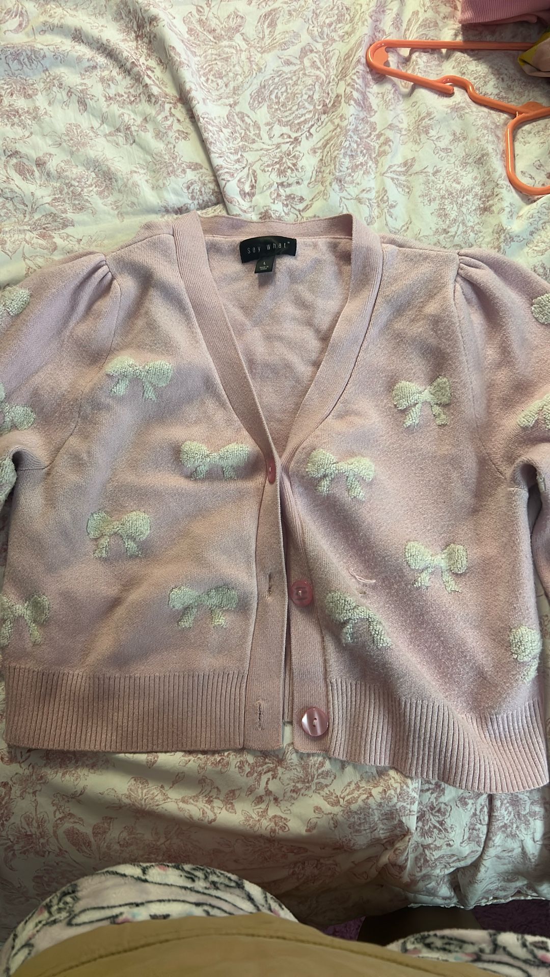 Cropped pink and white bow cardigan