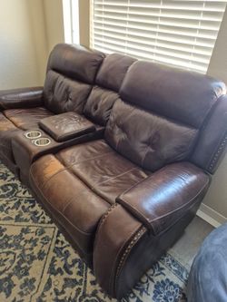 Leather couches and chair