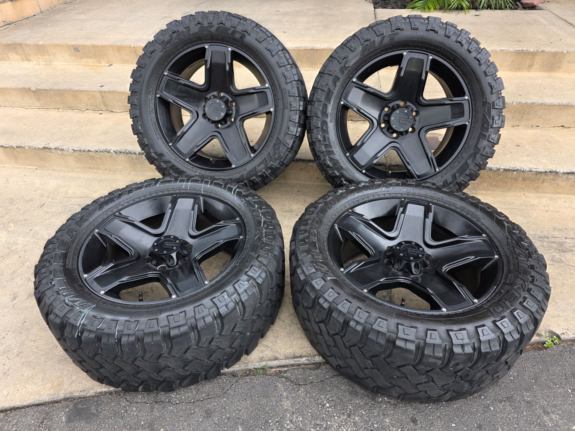 20" MAMBA rims w/ 33" Falken Wildpeak MT tires all terrains