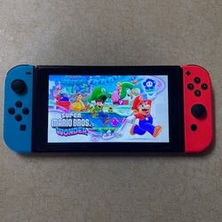 NINTENDO SWITCH V2 with 100 SWITCH GAMES and 7500 ARCADE GAMES