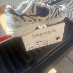Blue, Teal, Navy Blue, And White Saucony