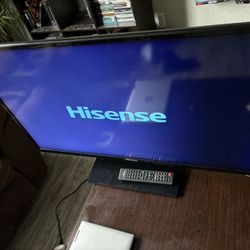30” Hisense tv + remote
